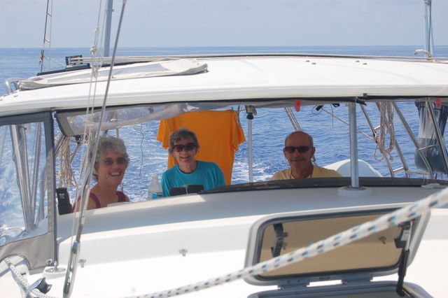 Susie, Liz and Dick Wood aboard Kia Orana