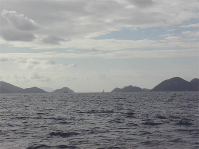 Sailing in Drake's Channel. Norman Island (left) St. Johns (right)