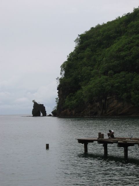 Sitting on the dock of Wallilabou bay