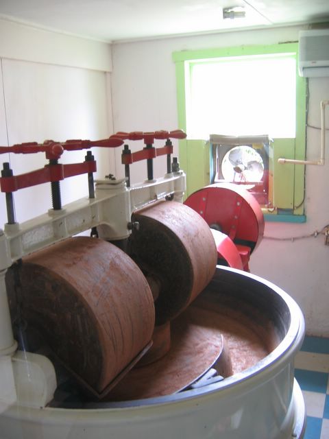 Crushing the chocolate bean, Grenada Chocolate Factory