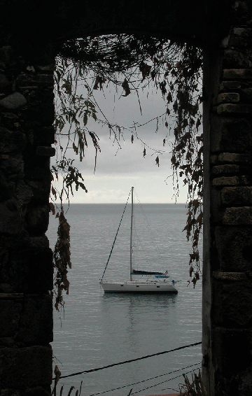 Eaux Vives through the window of a ruined house in Ste. Pierre, Martinique