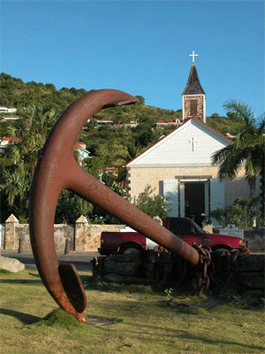 Large anchor and church