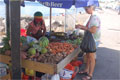 Susie and vegetable seller in St. Kitts
